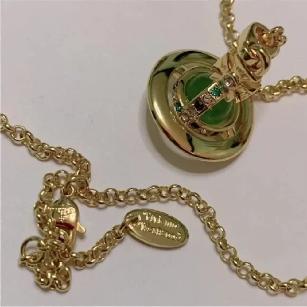 NIB Vivienne Westwood gold petite Saturn orb green crystal chain necklace